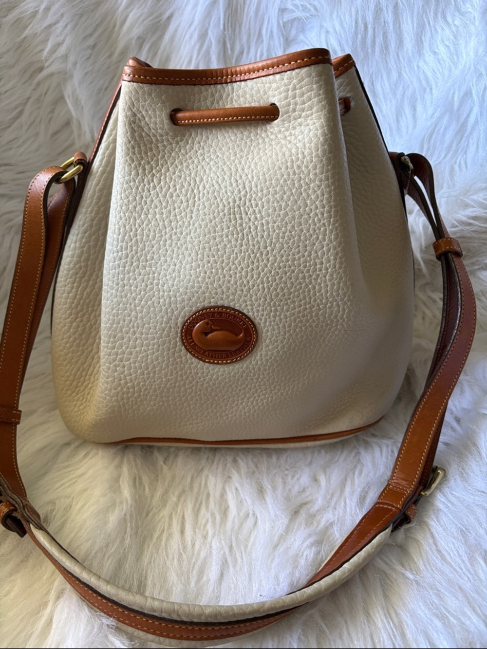 Dooney & Bourke Cream and Tan Leather Drawstring Shoulder Bag